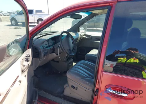 1999 Chrysler Town & Country Limited z USA, uszkodzony, nr VIN 1C4GP64LXXB906057